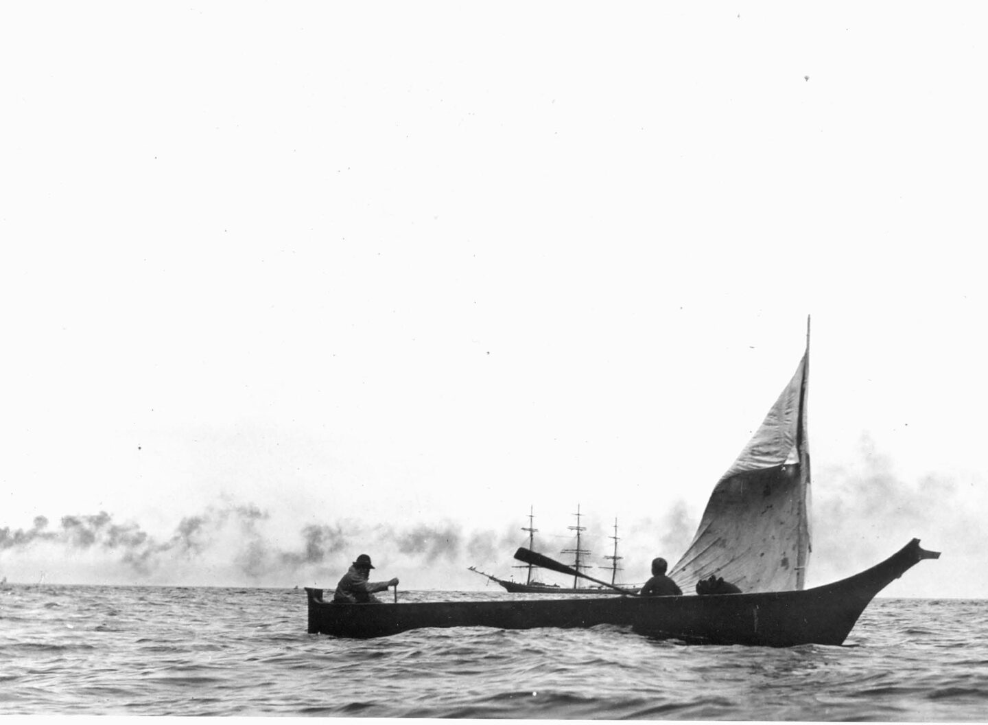 A canoe sails through Puget Sound circa 1900. Photographer: Anders B. Wilse. Photo credit: Mohai / Suquamish Museum.