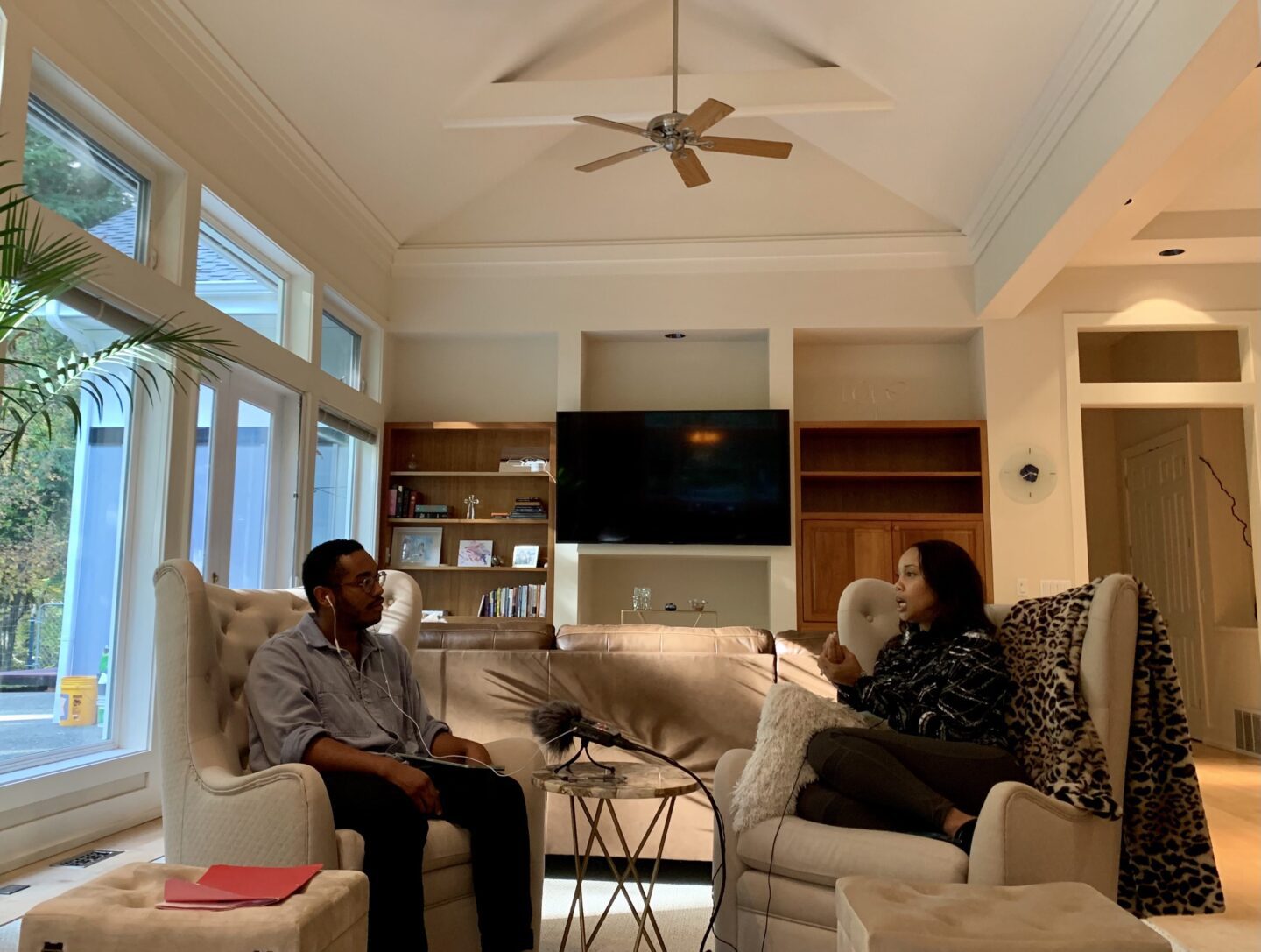 Ricky Reyes (left) interviews LeRin Farrison. Photo courtesy of Wa Na Wari.