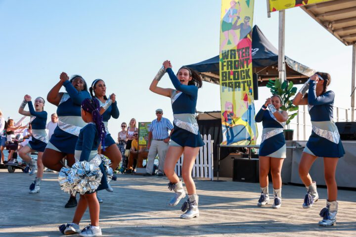 A cheer squad performs at Waterfront Block Party 2023.
