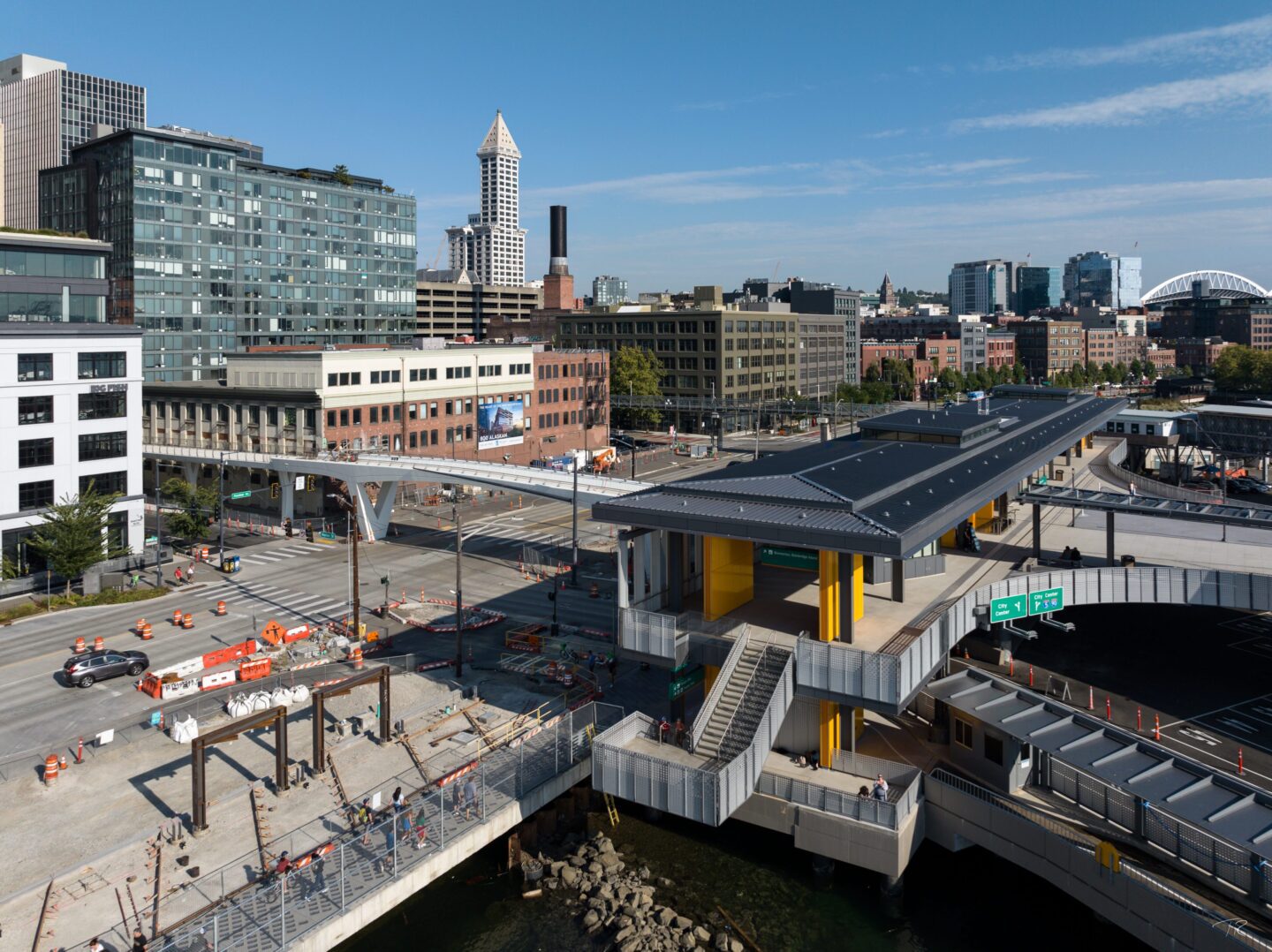 An aerial photo featuring the Marion Street Bridge connecting to Colman Dock.