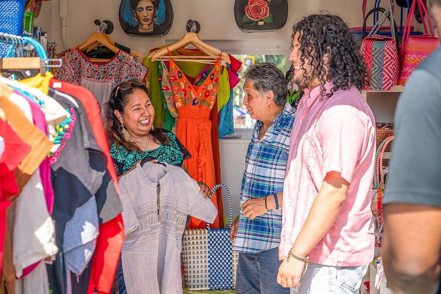 Griselda of Luna's Jewelry and Accessories attending to her customers.